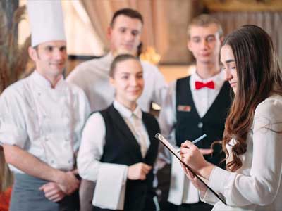 Professional hotel staff in the Gulf region