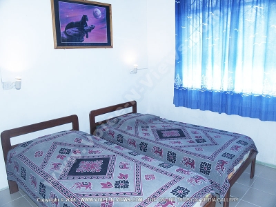 beach villa brigitte 3 mauritius single bedroom view
Brigitte 3 Beach Villa single bedroom. This bedroom is the same as the double bedroom, except it has two single beds.
Keywords: Brigitte 3 Beach Villa, single, bedroom, beds,