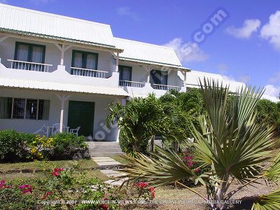 apartment larchipel mauritius general view
L'Archipel Apartments general view. The garden has lots of plants and palm trees. The apartments are all garden facing and each bedroom has a balcony. On the veranda downstairs are tables and chairs. The bungalows comprise of three air-conditioned studios, one double air-conditioned studio and one double self-catering apartment. All are sea-facing.
Keywords: L'Archipel Apartments, general view, vegetation, palm trees, plants, balcony, table, chairs, air-conditioned, studios, sea-facing
