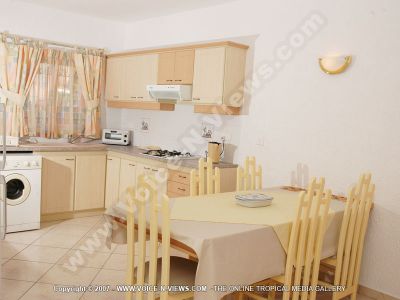 apartment orchidee mauritius kitchen view
Orchid?ɬe Apartment kitchen. The colour of the kitchen is peach. It is equipped with a dining table and chairs, a kettle, stove, oven/microwave, washing machine, fridge, washing sink, and cupboards.
Keywords: Orchid?ɬe Apartment, kitchen, fridge, stove, kettle, oven/microwave, washing machine, table, chairs, sink, cupboards