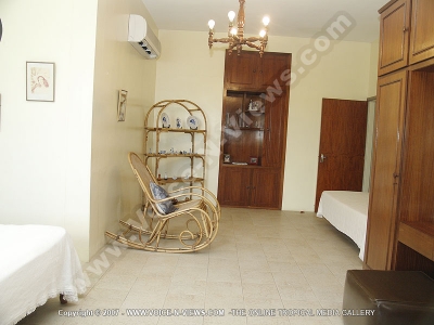 beach villa diane 1 mauritius room view
Diane Beach Villa room view. In air-conditioned the bedroom there is a bed, a chair and a wardrobe. 
Keywords: Diane Beach Villa, room, air-conditioned, bed, chair, wardrobe