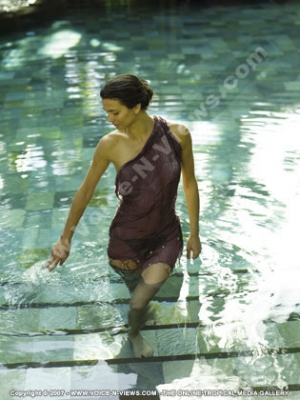 dinarobin hotel golf & spa mauritius spa lady in swimming pool
