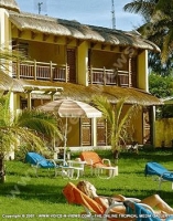 filao_village_hotel_mauritius_lady_relaxing_in_sunbed_and_general_view.jpg