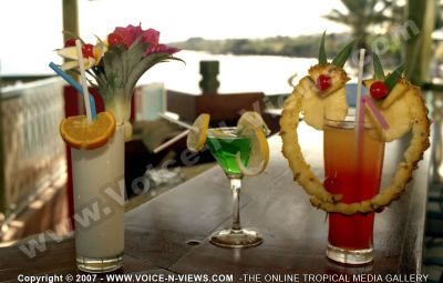 2 star hotel klondike hotel cocktail on the bar
A display of three refreshing delicious cocktails at the 2*Klondike Hotel. They are decorated with fruit; orange, lemon, pineapple, cherries and flowers.
Keywords: 2*fruit cocktails orange, pineapple, lemon, cherries