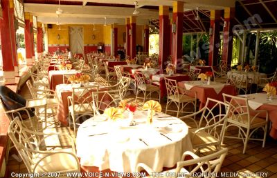 2 star hotel klondike hotel restaurant
A view of the 2*Klondike Hotel restaurant. Restaurant offering European, Chinese, Mauritian and Indian cuisine  All the tables are set with plates, knives and forks, glasses and napkins. There are overhead fans in the restaurant.
Keywords: 2*hotel restaurant, European, Chinese, Mauritian, Indian, cuisine, tables. chairs, cutlery,