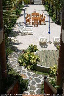 3 star hotel le palmiste hotel view
A view from Le Palmiste Resort & Spa, overlooks a small area with sun beds, tables and chairs where guests can relax.
Keywords: Le Palmiste Resort & Spa view, sun beds, tables and chairs,