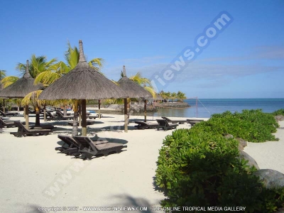 laguna beach hotel and spa grand river south east beach with kiosk and sunbed
