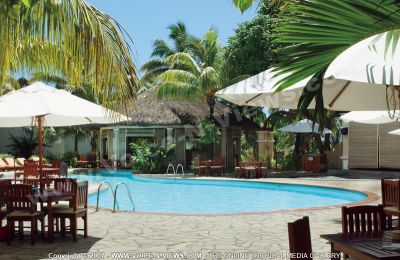 3 star veranda palmar beach hotel view
Veranda Palmar Beach Hotel swimming pool. Guests can sit on the chairs under umbrellas or relax on the sunbeds. Palm trees surround the swimming pool. There are two bars a the Hotel which offer cool refreshments and exotic cocktails. The bar and the Hibiscus restaurant, which offers delicious island cuisine, are both situated near the pool.
Keywords: 3*hotel, swimming pool, palm trees, tables, chairs, umbrellas, bar, refreshments, exotic, cocktails, restaurant, delicious, cuisine