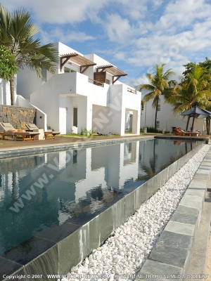 le recif hotel mauritius swimming pool and hotel side view
