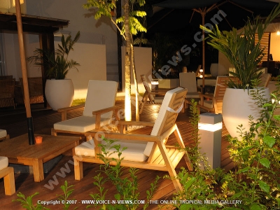 le recif hotel mauritius the patio at night
