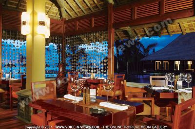 4 star heritage awali golf & spa resort restaurant
Mauritius Hotel restaurant. This is one of the five restaurants at the hotel and is situated near the swimming pool area. It is decorated in a reddish-brownish colour. The tables are set with side plates, cutlery, glasses, napkins.
Keywords: 4*hotel, restaurant, five,  tables, plates, cutlery, glasses, napkins, swimming pool