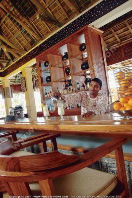 4 star heritage awali golf & spa resort zenzibar
Hotel bar view. There are two bars at the hotel. A barman at work, making delicious cocktails. A display of oranges completes the bar.
Keywords: 4*hotel, bar, two, barman, cocktails, fruit, oranges,