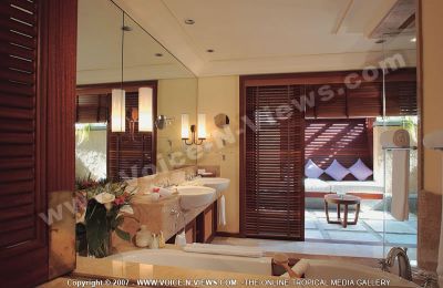 5 star hotel constance belle mare plage view from villas
The outstanding bathroom of a private pool equipped with a bath tub, towels, two separate washbasin overlooking the villa terrace which lead to the private swimming pool.
