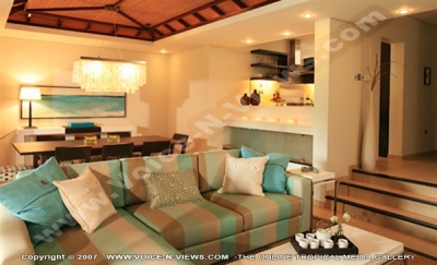 four seasons resort mauritius at anahita dining and living room watermark view
