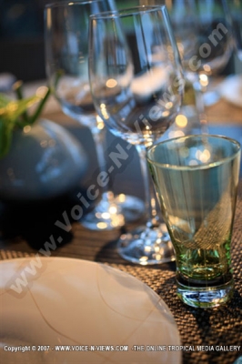 four seasons resort mauritius at anahita glass setup on restaurant table watermark view
