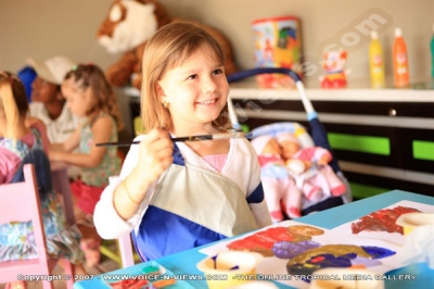 four seasons resort mauritius at anahita kids fun time at miniclub watermark view
