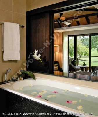 four seasons resort mauritius at anahita master bathroom watermark view
