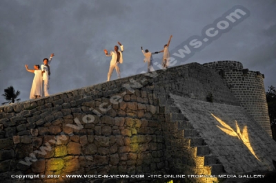 four seasons resort mauritius at anahita night dancin show watermark view
