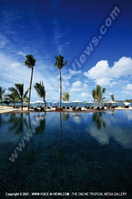 anahita resort mauritius swimming pool trees and ssunbed watermark view
