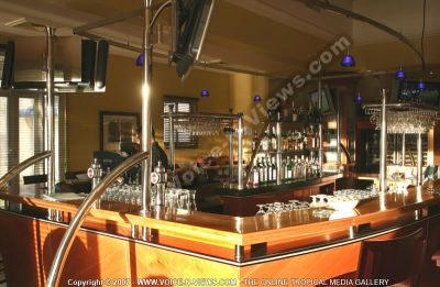 5 star hotel le suffren  and marina hotel view of bar
A view of the 5*Suffren and Marina bar. Guests can sit at the bar and enjoy drinks and cocktails and watch t.v. The blue lights overhead complete the look of the bar.
Keywords: 5*hotel, bar, view, glasses, drinks, cocktails, blue, lights, t.v.'s