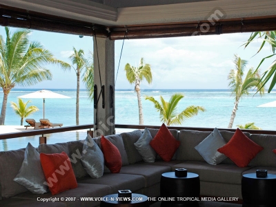 les pavillons hotel mauritius terrace and sea view from the bar

