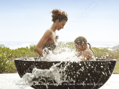 5 star hotel shanti maurice family villa playing with water

