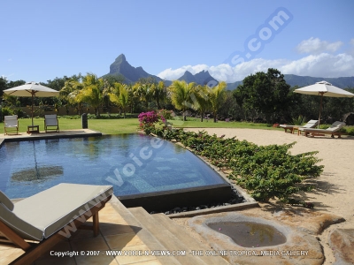 tamarina golf spa and beach club mauritius villa swimming pool and garden view
