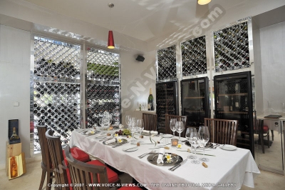 the grand mauritian a luxury collection resort and spa mauritius brezza wine cellar dining room at daytime
