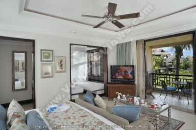 the grand mauritian a luxury collection resort and spa mauritius family room and balcony view
