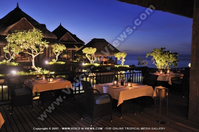 the grand mauritian a luxury collection resort and spa mauritius season by stephane terrace at night
