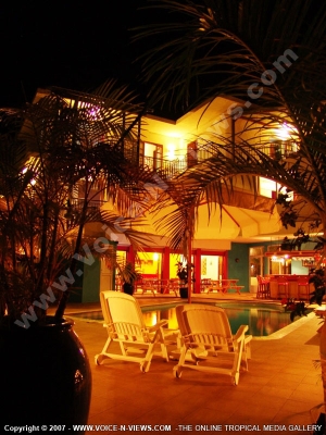 the pool side its sun beds les orchidees hotel mauritius
