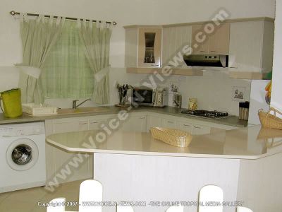 apartment latanier mauritius kitchen view
Latanier Apartment kitchen. The kitchen is equiped with stove, microwave, washing machine, washing sink and cupboards.
Keywords: Latanier Apartment, kitchen, microwave, stove, washing machine, cupboards, cutlery, washing sink