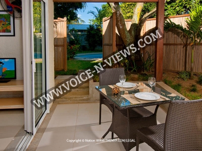 Garden Retreat hibiscus apartment terrace and pool
Garden Retreat hibiscus apartment common area opens on terrace patio.
Keywords: Garden Retreat Apartment, Apartments Mauritius, Pereybere Apartments Mauritius