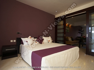 grand bay suites mauritius luxurious bedroom and living room
