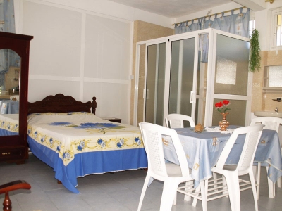 les bougainvillers apartments mauritius bedroom and bathroom view
