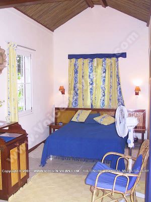 budget guesthouse pointe d'esny mauritius ref 165 double bedroom view
Budget Guesthouse Pointe d'Esny Mauritius Ref 165 view of double bedroom. Kept in typical Mauritian style, the rooms are nicely furnished, each with its own shower/toilet and host up to 2 guests. The room is decorated in blue and yellow and has a double bed with headboard and side tables, a chair, a fan and a cabinet.
Keywords: Noix de Coco, double, bedroom, blue, yellow, chair, fan, headboard, bedside tables, cabinet, furnished, shower, toilet