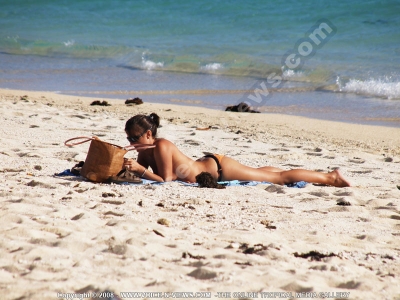 woman bikini lying beach le morne mauritius
