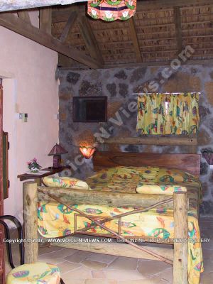 standard guesthouse bambous virieux mauritius ref 158 bedroom view
Standard Guesthouse Bambous Virieux Mauritius Ref 158 view of the bedroom. Built in stone and timber and covered with thatch, Le Barachois reflects the rustic style of long ago. The bed is made from wood, the wall is stone and the roof is thatch.
Keywords: Le Barachois, guesthouse, bedroom, wood, stone wall, thatch roof