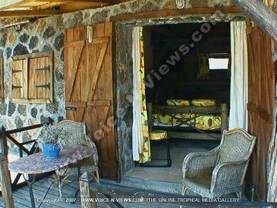 standard guesthouse bambous virieux mauritius ref 158 terasse view
Standard Guesthouse Bambous Virieux Mauritius Ref 158 terrace view. The bedroom leads out onto the terrace which has chairs and table and looks out on the water.
Keywords: Le Barachois, guesthouse, terrace, chairs, table