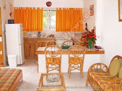 guest house tropicana mauritius kitchen view
Tropicana guesthouse view of the kitchen. The American style kitchen is equipped with fridge, microwave, toaster, stove, a breadbin, cutlery, mugs. The kitchen looks onto the living room. There is a dining table and chairs. A telephone for the guests use is also available.
Keywords: Tropicana guesthouse, kitchen, American-style, dining table, fridge, microwave, toaster, telephone, bread bin, stove, cutlery, mugs
