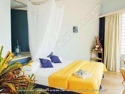 superior guesthouse rivi?ɬre des anguilles mauritius ref 160 bedroom view
Superior Guesthouse Rivi?ɬre Des Anguilles Mauritius Ref 160 bedroom view. The room is decorated in blue, yellow and white. It has a double bed, a mosquito net, ceiling fans, tea and coffee facilities and electronic safe. 
Keywords: superior guesthouse rivi?ɬre des anguilles mauritius ref 160, bedroom, double bed, yellow, blue, white, flowers, mosquito net, ceiling fans, tea and coffee facilities and electronic safe