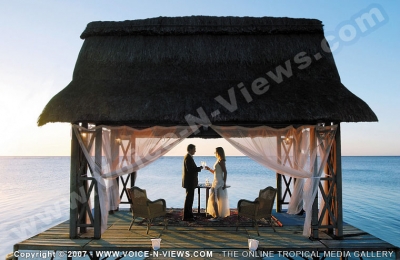 trou aux biches resort & spa mauritius just married couple on the jetty
