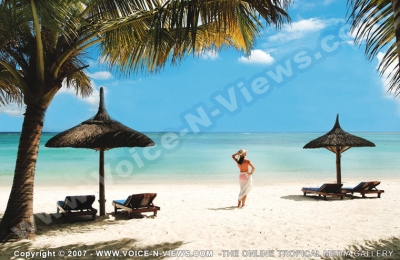trou aux biches resort & spa mauritius lady on the beach
