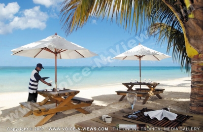 trou aux biches resort & spa mauritius lespadon restaurant mise en place and sea view
