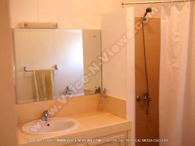 beach villa myr mauritius bathroom view
Myr Beach Villa bathroom view. The bathroom is decorated in peach. It has an overhead shower, a basin, WC. The bathroom comes equipped with towels.
Keywords: Myr Beach Villa, bathroom, peach, shower, basin, towels