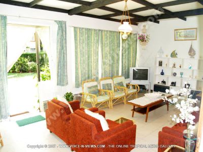 beach villa patricia mauritius tv room
Patricia Beach Villa t.v. room view. In the t.v room there are sofas, chairs, a coffee table, a television. This room opens out onto a garden.
Keywords: Patricia Beach Villa, tv room, sofas, chairs, coffee table, television, garden