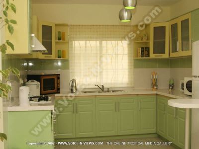 villa 4 heavens mauritius kitchen view
The Four Heavens Villa kitchen is situated on the ground floor of the villa. It is decorated in green and is equipped with a fridge, a stove, microwave, kettle, cooking utensils, oven and green cupboards.
Keywords: Four Heavens Villa, kitchen, microwave, fridge, cooking utensils, kettle, stove, cupboards, green, oven